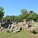 The ruins of a temple near a forest
